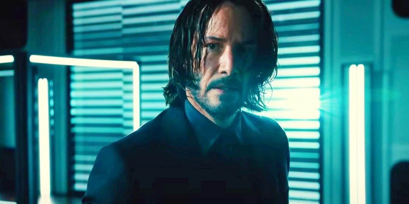 Keanu Reeves lit in blue in John Wick Chapter 4