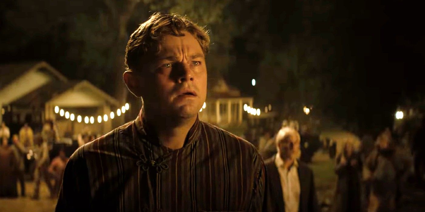 Leonardo DiCaprio as Ernest Burkhart looking troubled at night in Killers of the Flower Moon