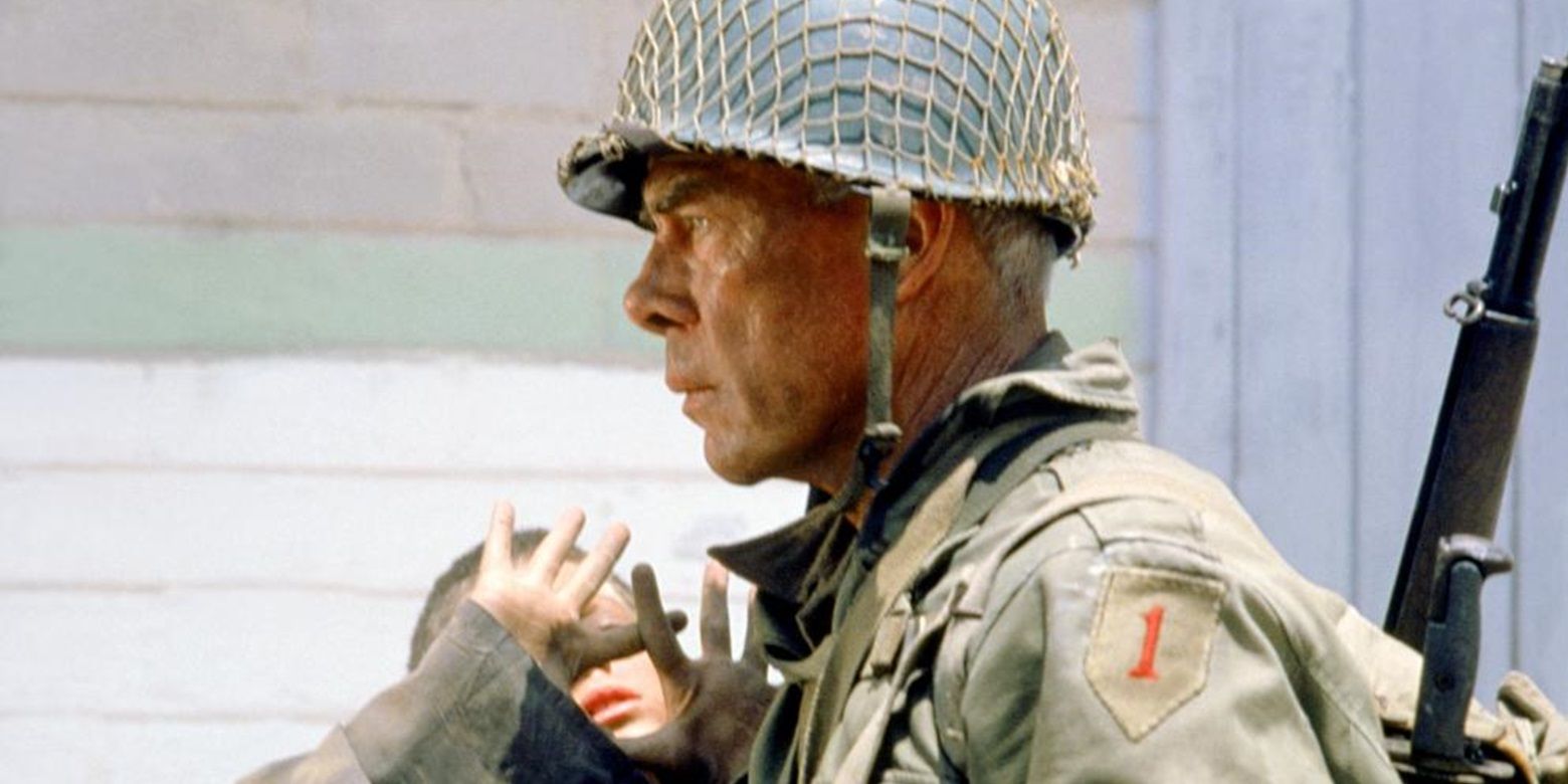 Lee Marvin carrying someone in The Big Red One