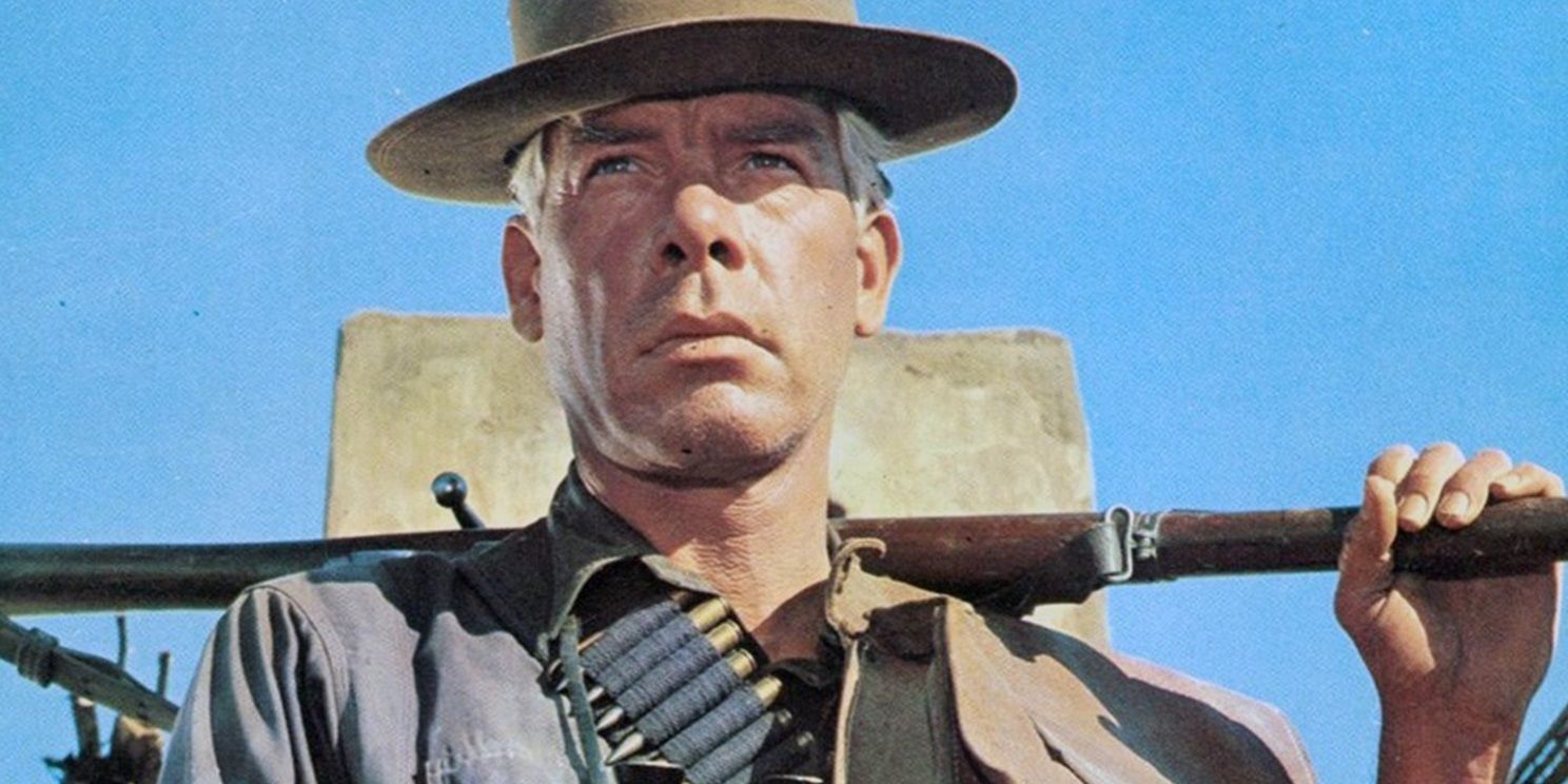Lee Marvin with a gun in The Professionals