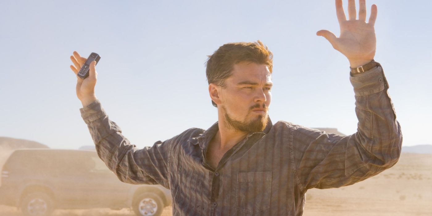 Leonardo DiCaprio as Roger Ferris with his hands up in Body of Lies