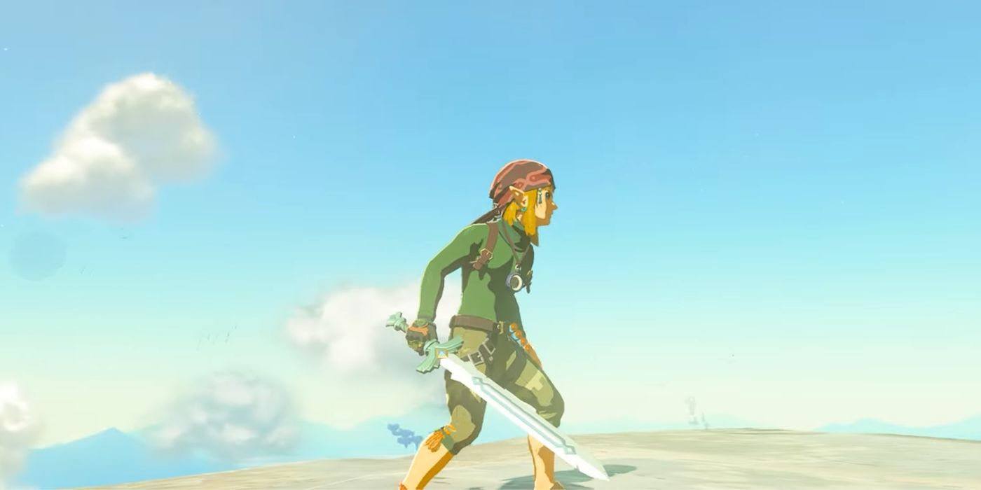 Link standing on a cliff and holding the White Sword of the Sky in Zelda: Tears of the Kindgom.