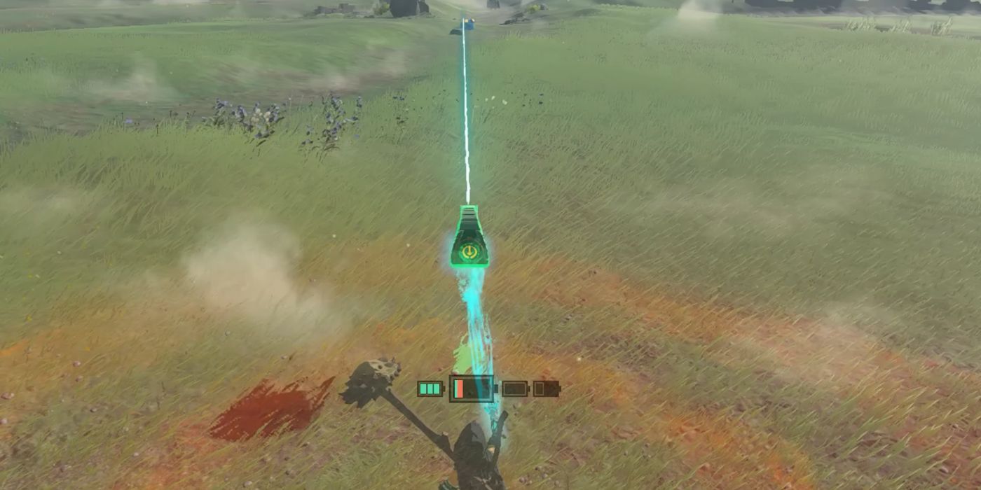 Link holding up a Beam Emitter with the Ultrahand ability and using it to finish off an enemy in the distance of Tears of the Kingdom.