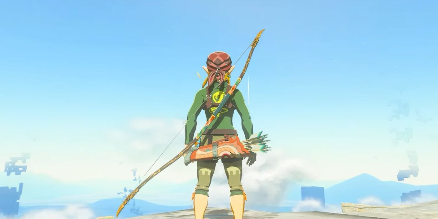 Link standing on a cliff with the Demon King's Bow on his back in Zelda: Tears of the Kingdom.
