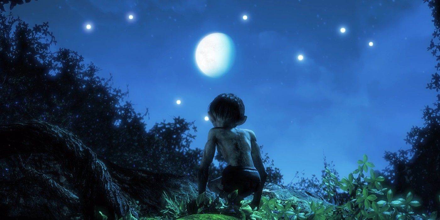 Golllum sitting on a hill at nighttime, while looking up a the full moon in a dark blue sky.