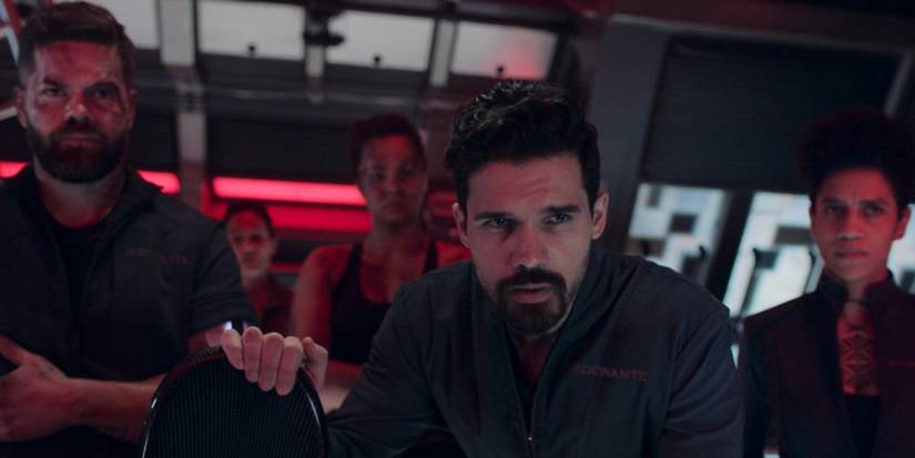 Holden (Steven Strait), Naomi (Dominique Tipper), and Amos (Wes Chatham) inside the Rocinante in The Expanse 