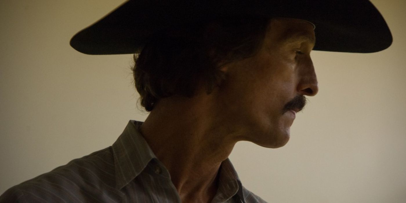 Matthew McConaughey wearing a hat and looking sideways in Dallas Buyers Club