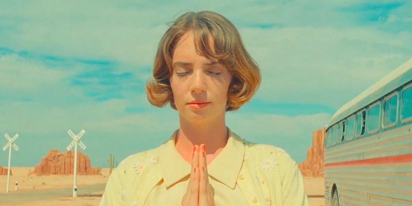 Maya Hawke praying in the movie Asteroid City