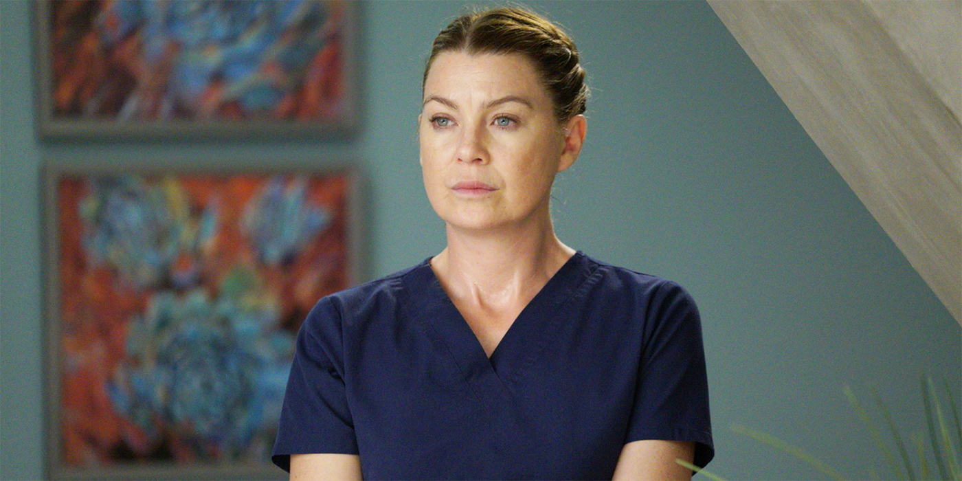 Meredith Grey in Grey&rsquo;s Anatomy standing in hallway wearing scrubs