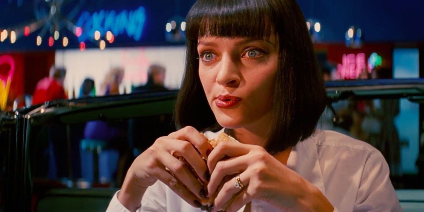 Mia Wallace eating her burger in Pulp Fiction