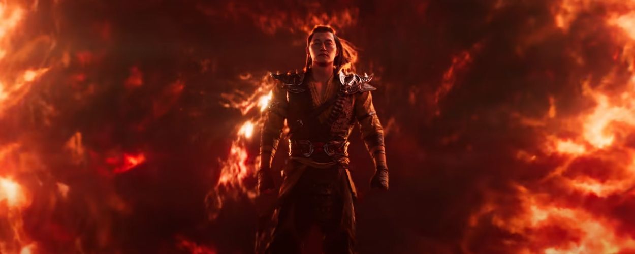 Shang Tsung emerges from a red fiery portal in Mortal Kombat 1.