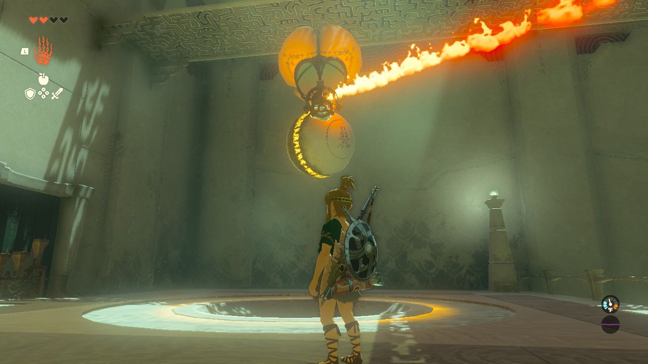 Link standing in front of a large ball with a floating device attached to carry it