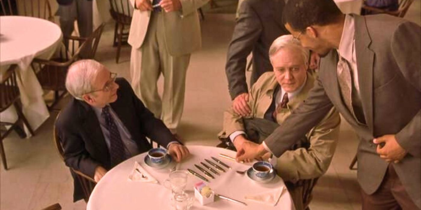 Princeton professors placing their pens on a table as John Nash looks at them in A Beautiful Mind
