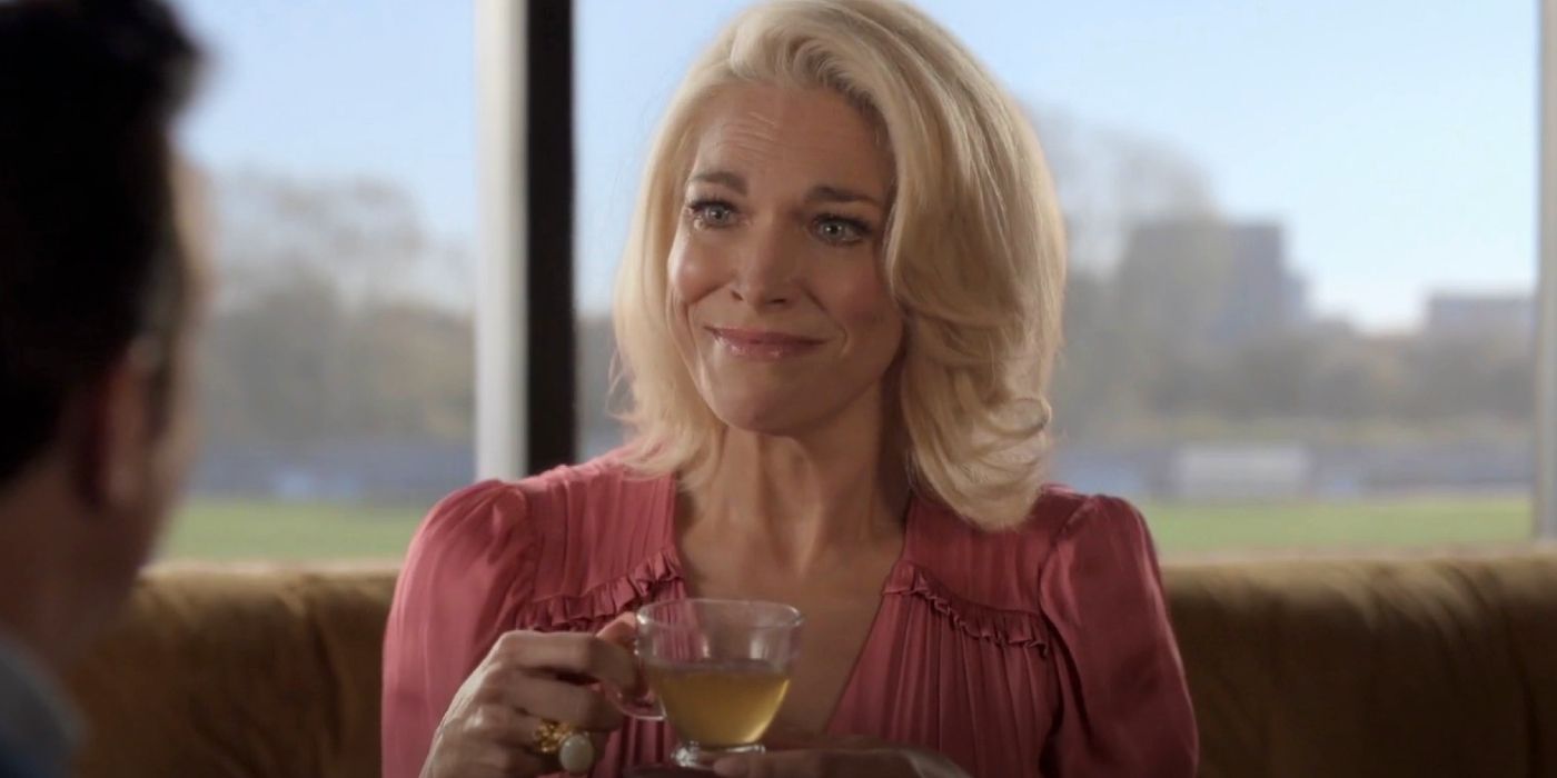 Rebecca drinking tea and smiling at Ted Lasso in season 3, episode 10