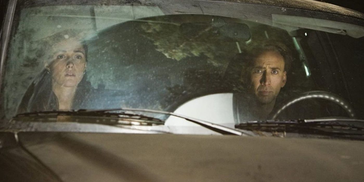 Rose Byrne and Nicolas Cage in a car in Knowing