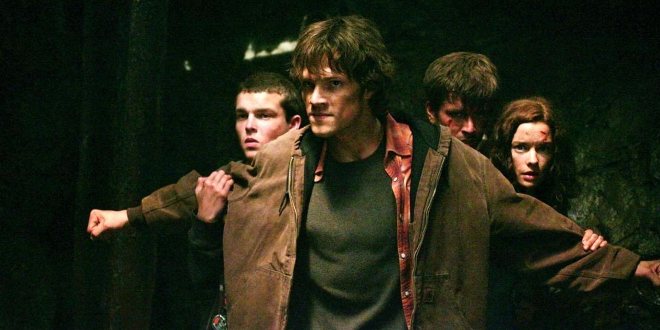 Sam protecting a family in the Supernatural episode Wendigo