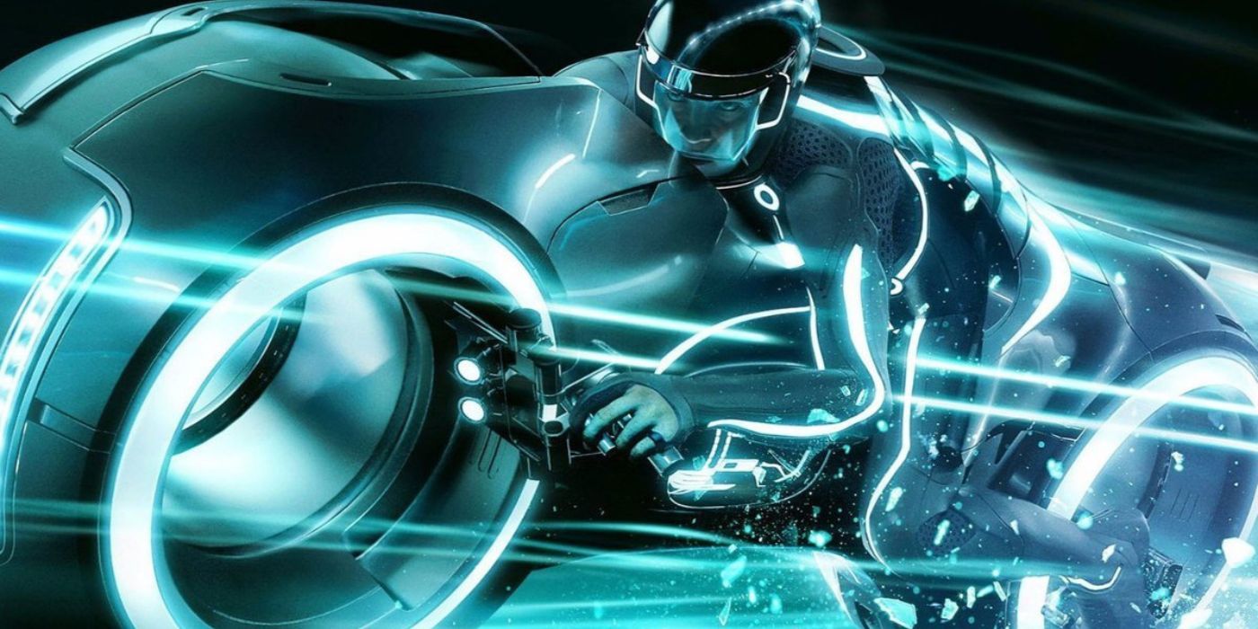 Sam riding a light cycle in Tron Legacy