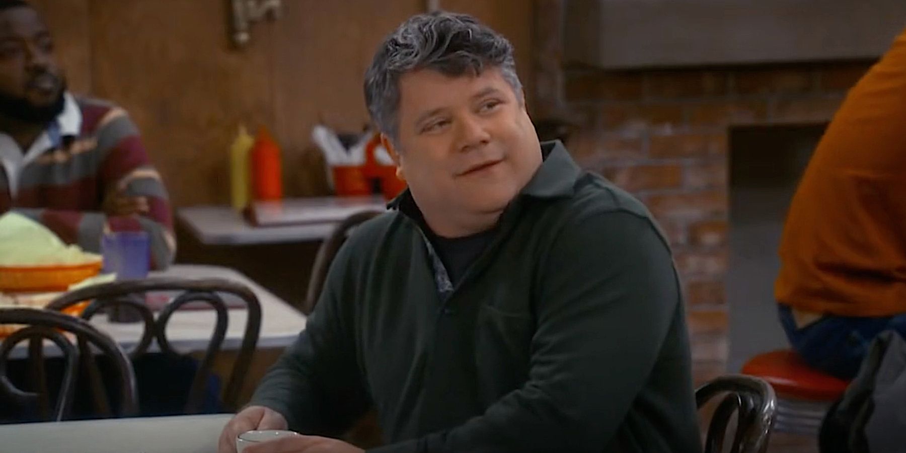Sean Astin sitting down in The Conners season 5 episode 20