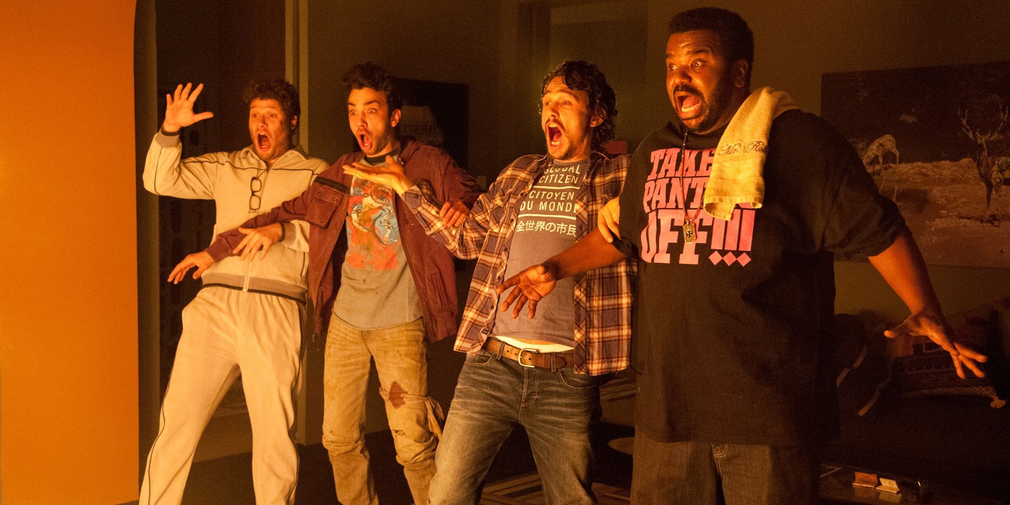 Seth Rogen, Jay Baruchel, James Franco, and Craig Robinson jumping from a fire in This is the End.