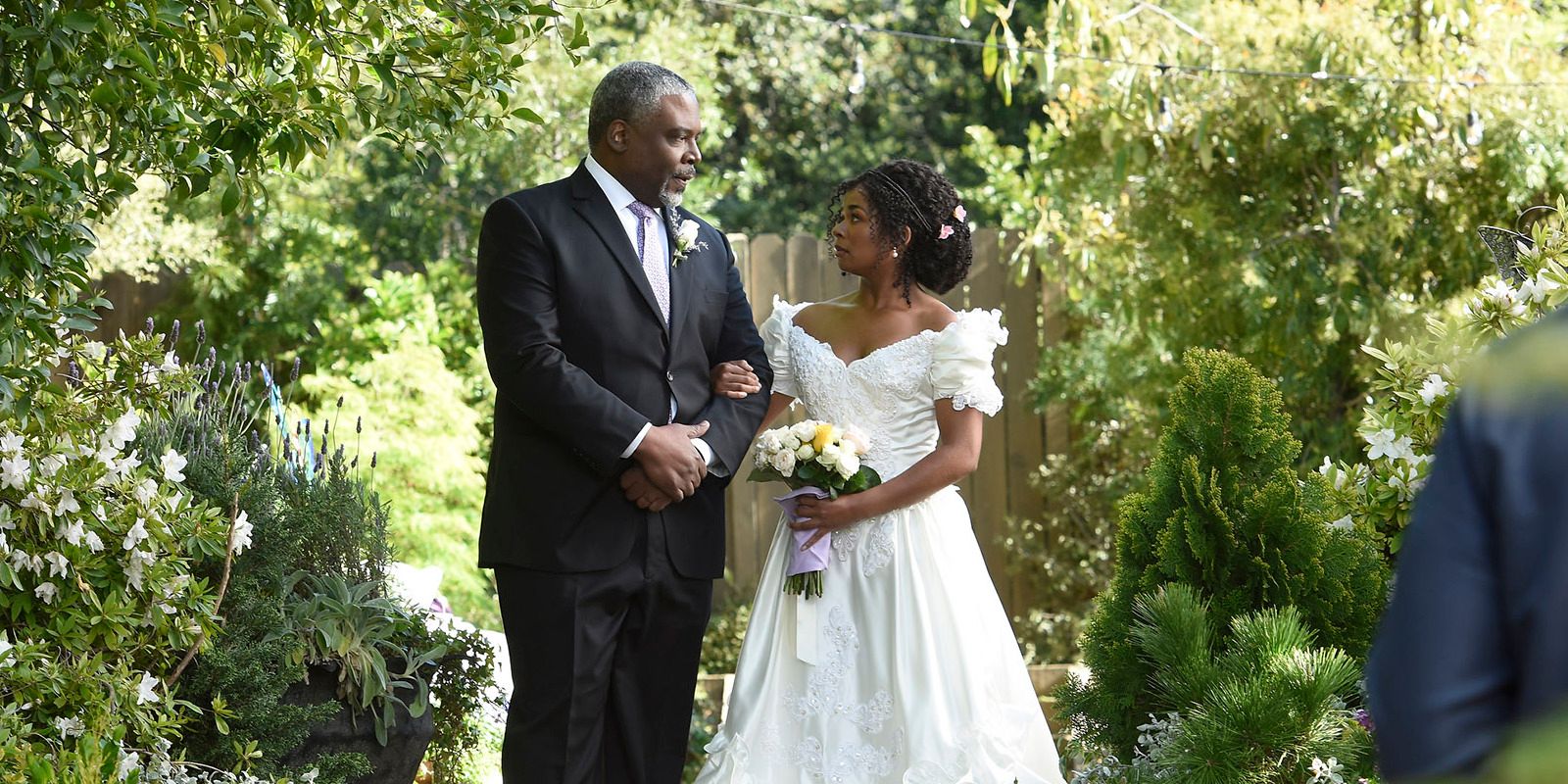 Simone and her father walking down the aisle on her wedding day in the Grey's Anatomy season 19 finale