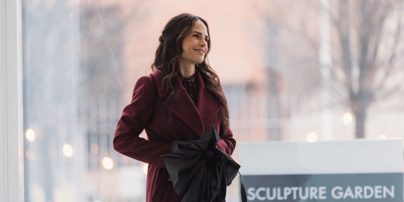 Jordana Brewster smiles while looking on in Simulant