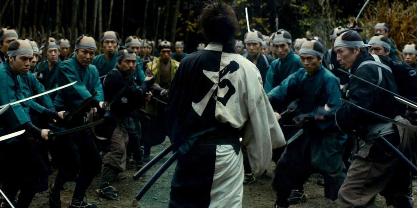 Soldiers surrounding Manji in the finale of the Blade of the Immortal movie