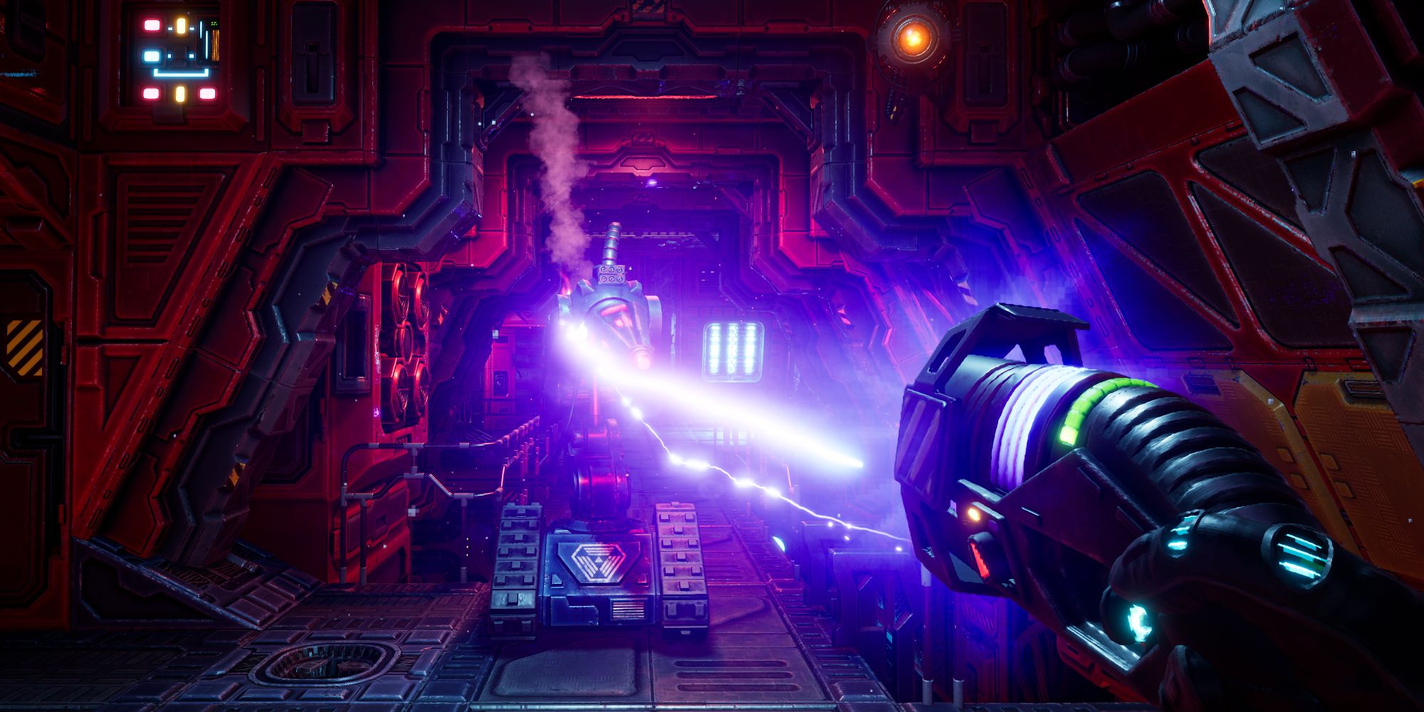 Screenshot of System Shock remake shows FPS view of player using an eletric pistol against a large laser moving around on treads in a red metal hallway.