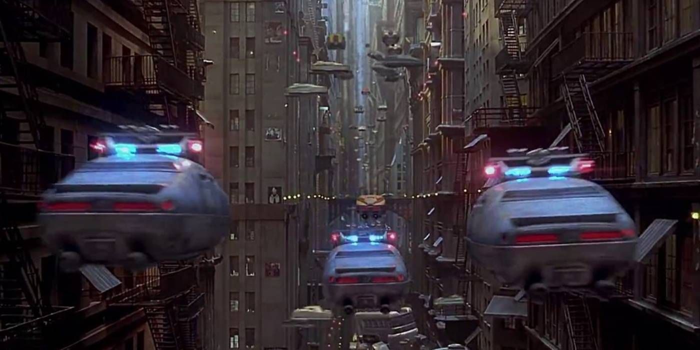 Flying police cars chasing a taxi cab in the city in The Fifth Element
