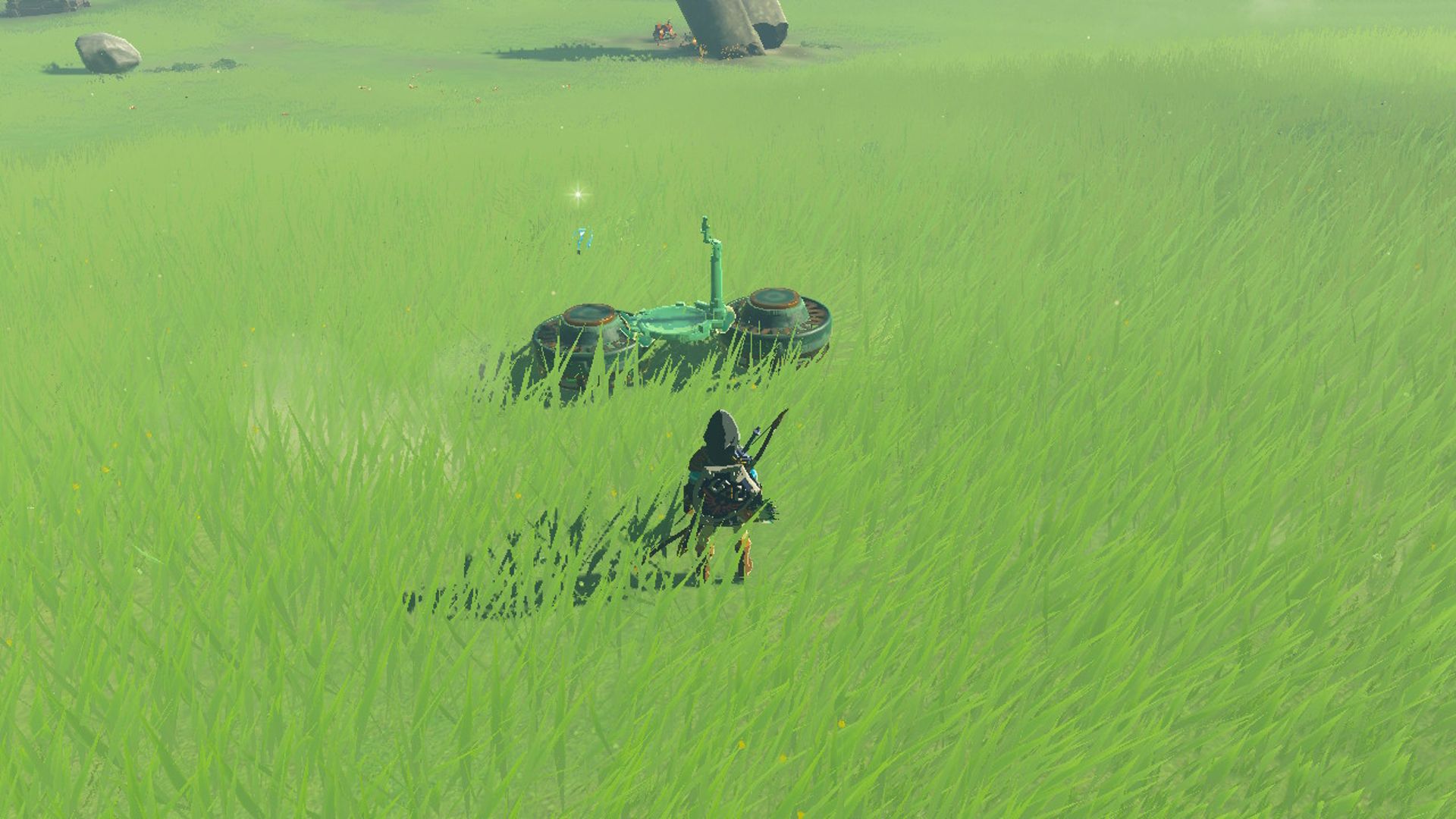 The Legend Of Zelda Tears Of The Kingdom Link Examining Two-Fan Hover Bike In Grassy Field