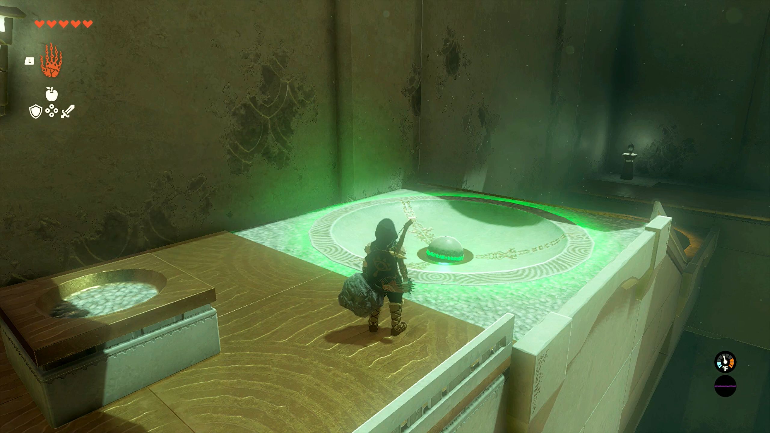 The Legend Of Zelda Tears Of The Kingdom Link Using Ultrahand To Move Stone Ball Into First Pit In Sepapa Shrine
