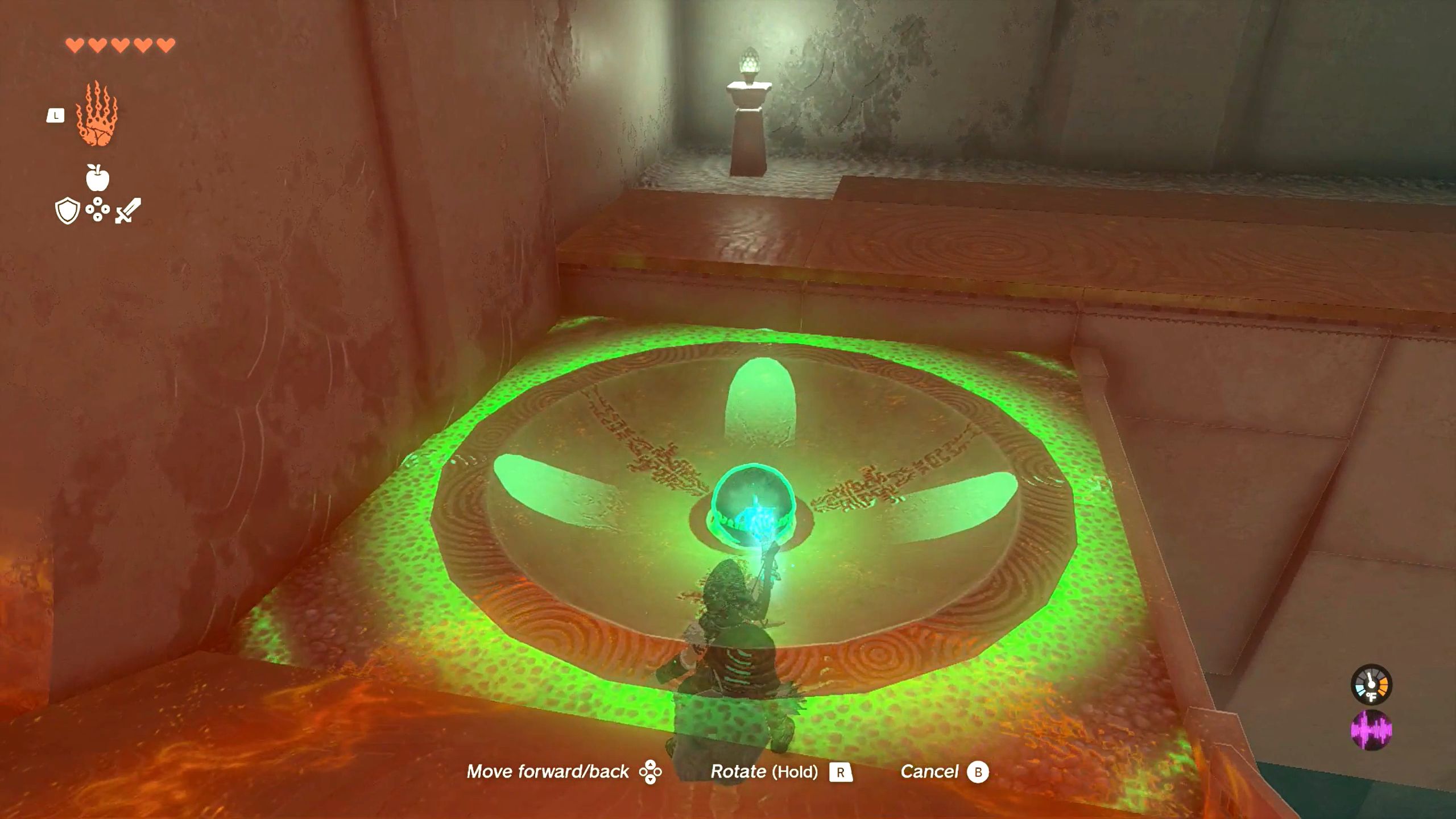 The Legend Of Zelda Tears Of The Kingdom Link Using Ultrahand To Move Stone Ball Into Second Pit In Sepapa Shrine
