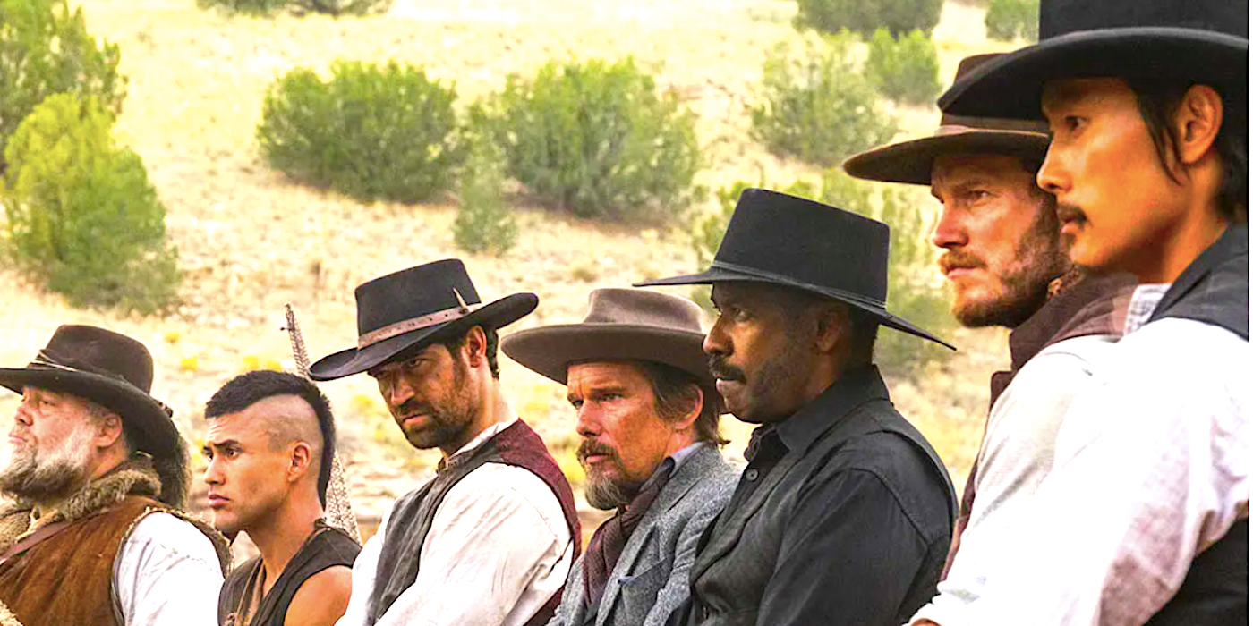 The entire cast of The Magnificent Seven 2016 prepare to fight a group of bandits.