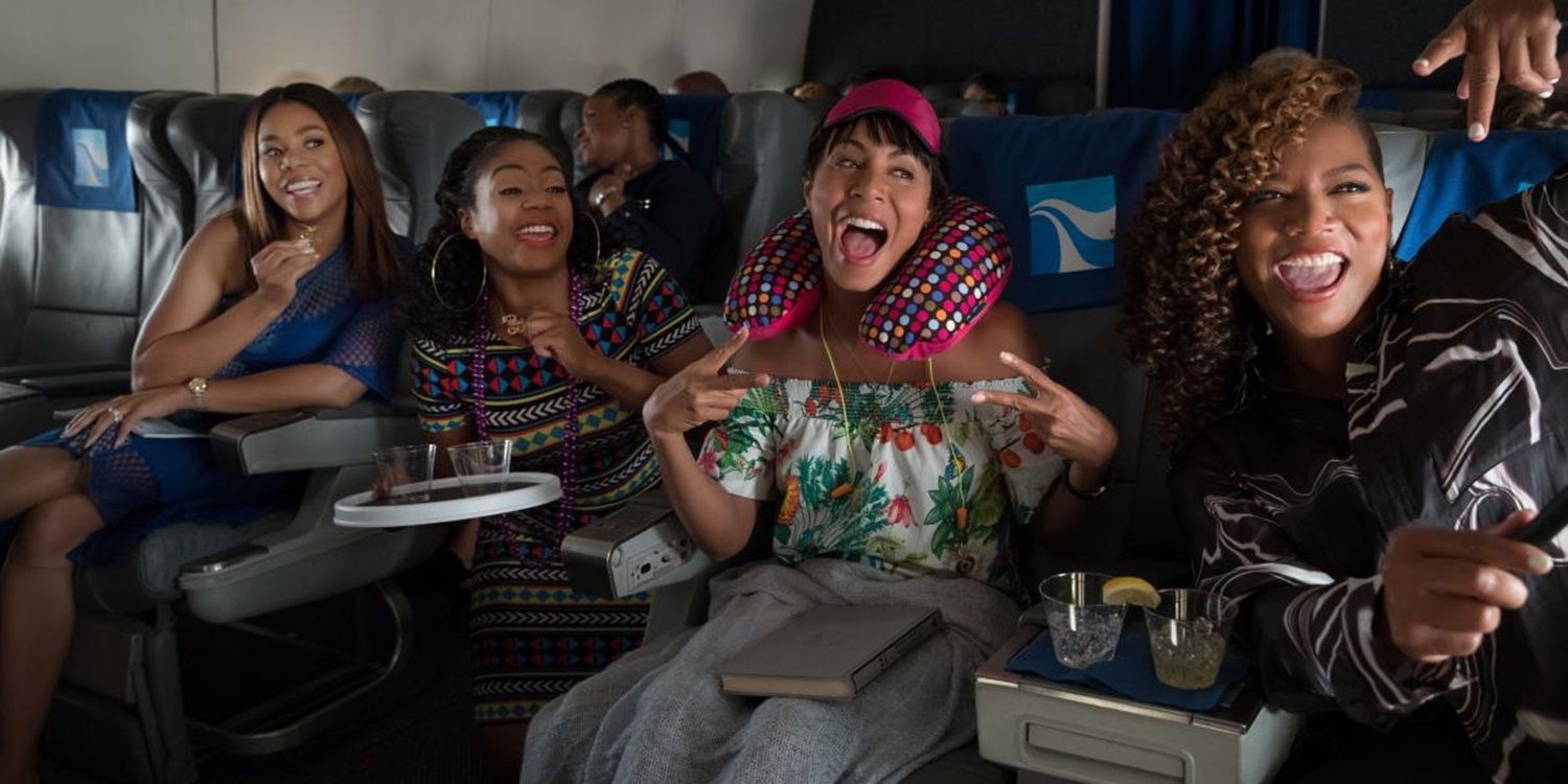 The cast of Girls Trip on a plane