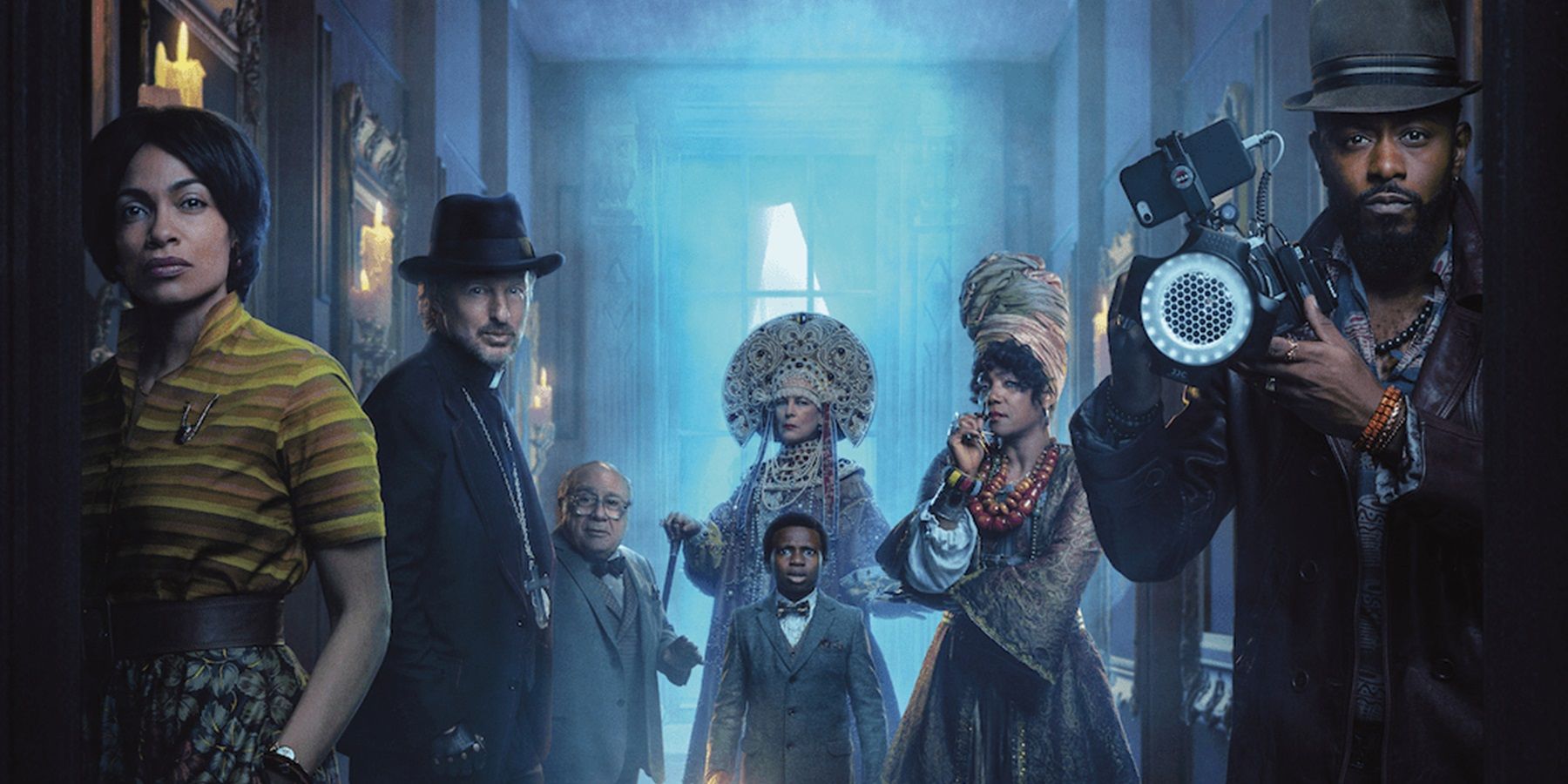 The cast of Haunted Mansion on the poster