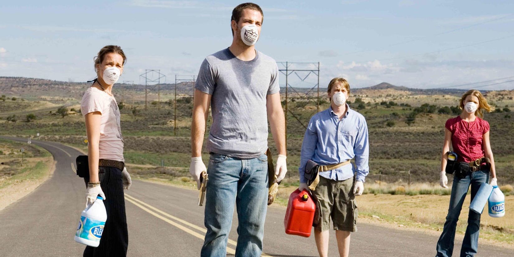 The survivors wearing masks in Carriers