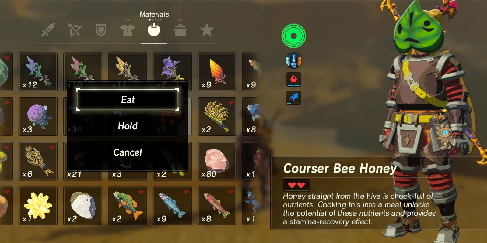 Tangkapan layar menunjukkan menu bahan yang berantakan di Breath of the Wild, menampilkan Courser Bee Honey yang menonjol.  Link berdiri di samping, memakai topeng korok.