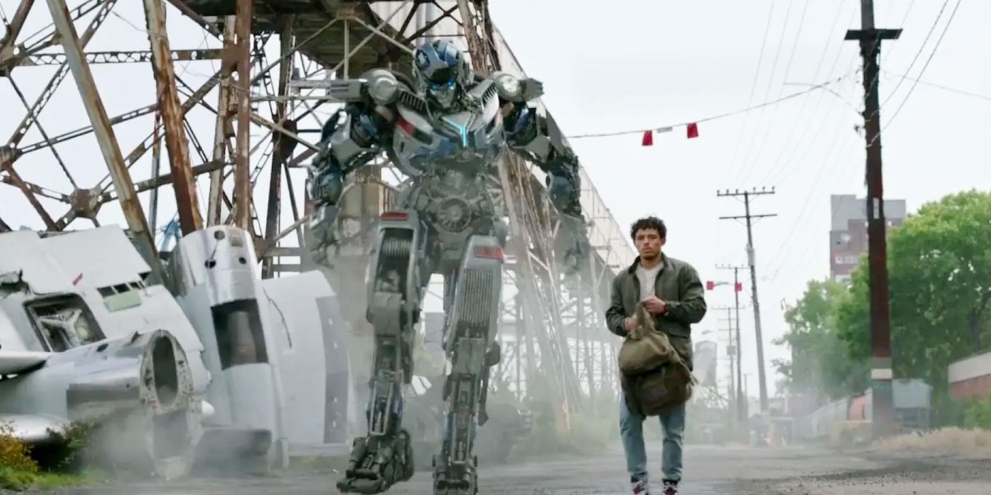 Anthony Ramos as Noah and Mirage Walking in the Debris in Transformers 7