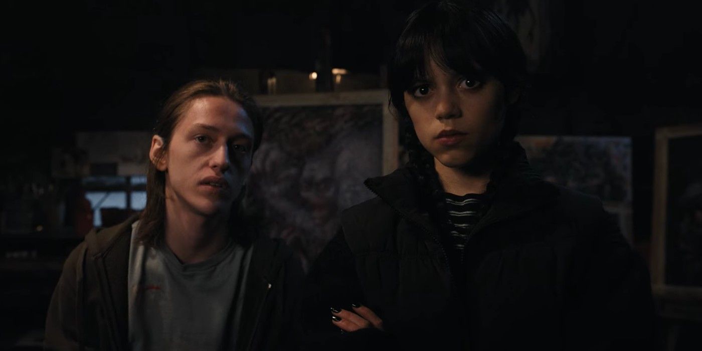 Jenna Ortega and Percy Hynes White as Wednesday and Xavier looking serious in Wednesday