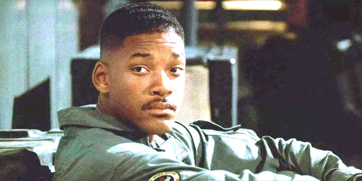 Will Smith In Independence Day in a pilots jumpsuit looking slightly sad