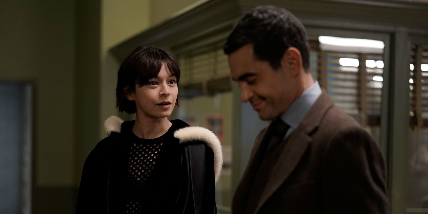 Will Trent, wearing a brown three-piece suit, and Ava Green, wearing a black jacket over a black mesh shirt, share a scene in Will Trent season 1, episode 5.
