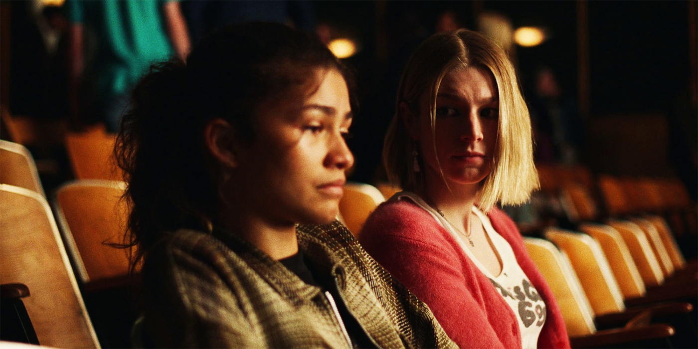 Zendaya as Rue and Hunter Schafer as Jules at the school auditorium in Euphoria season 2