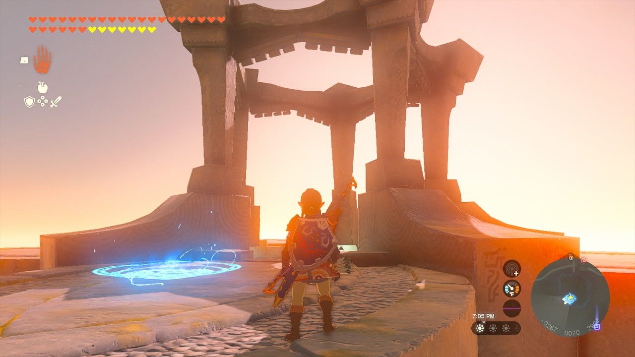 Link standing on a sky island with an Ancient Tablet in Tears of the Kingdom.