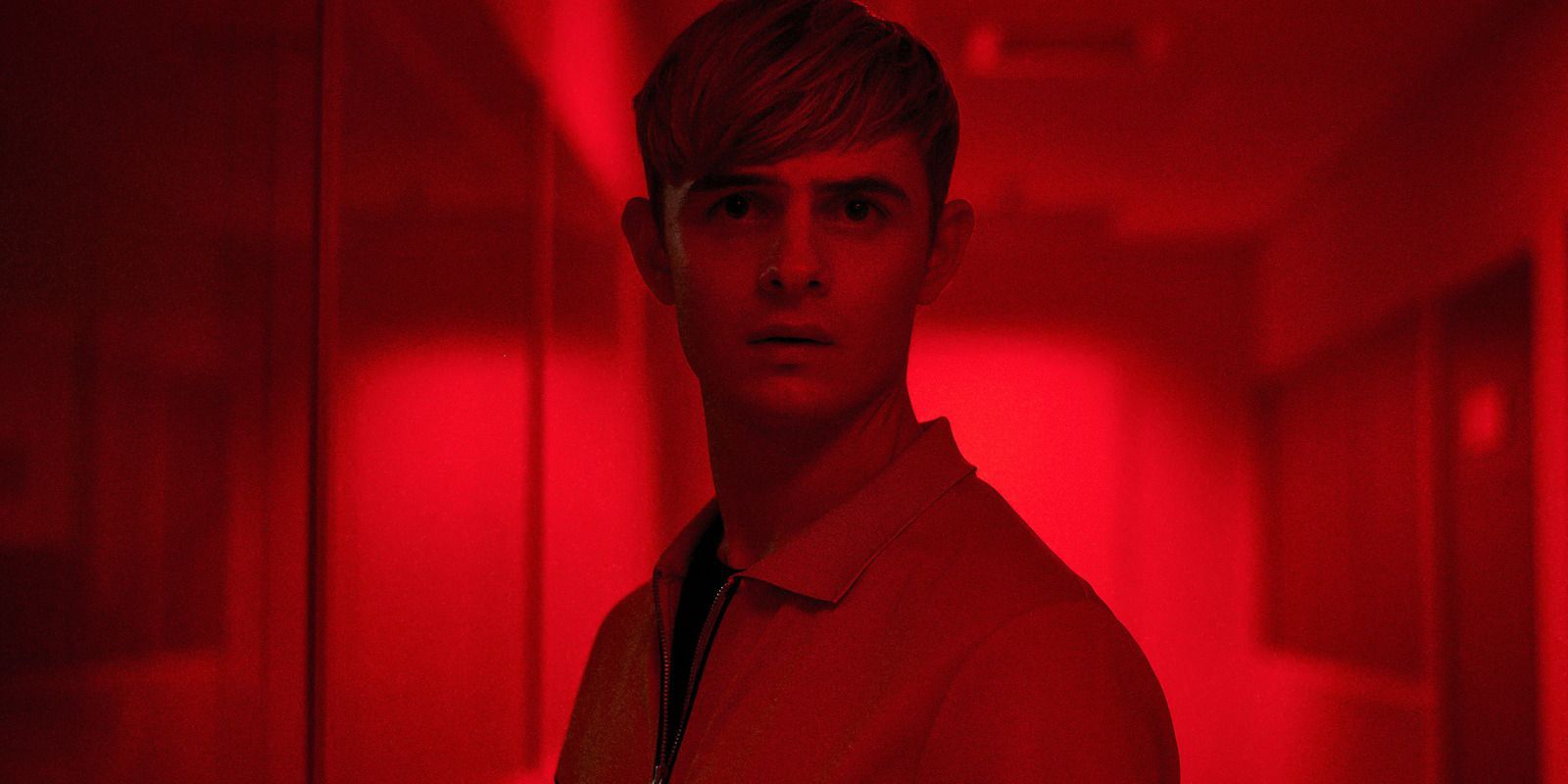 Alex Rider in a glowing red room