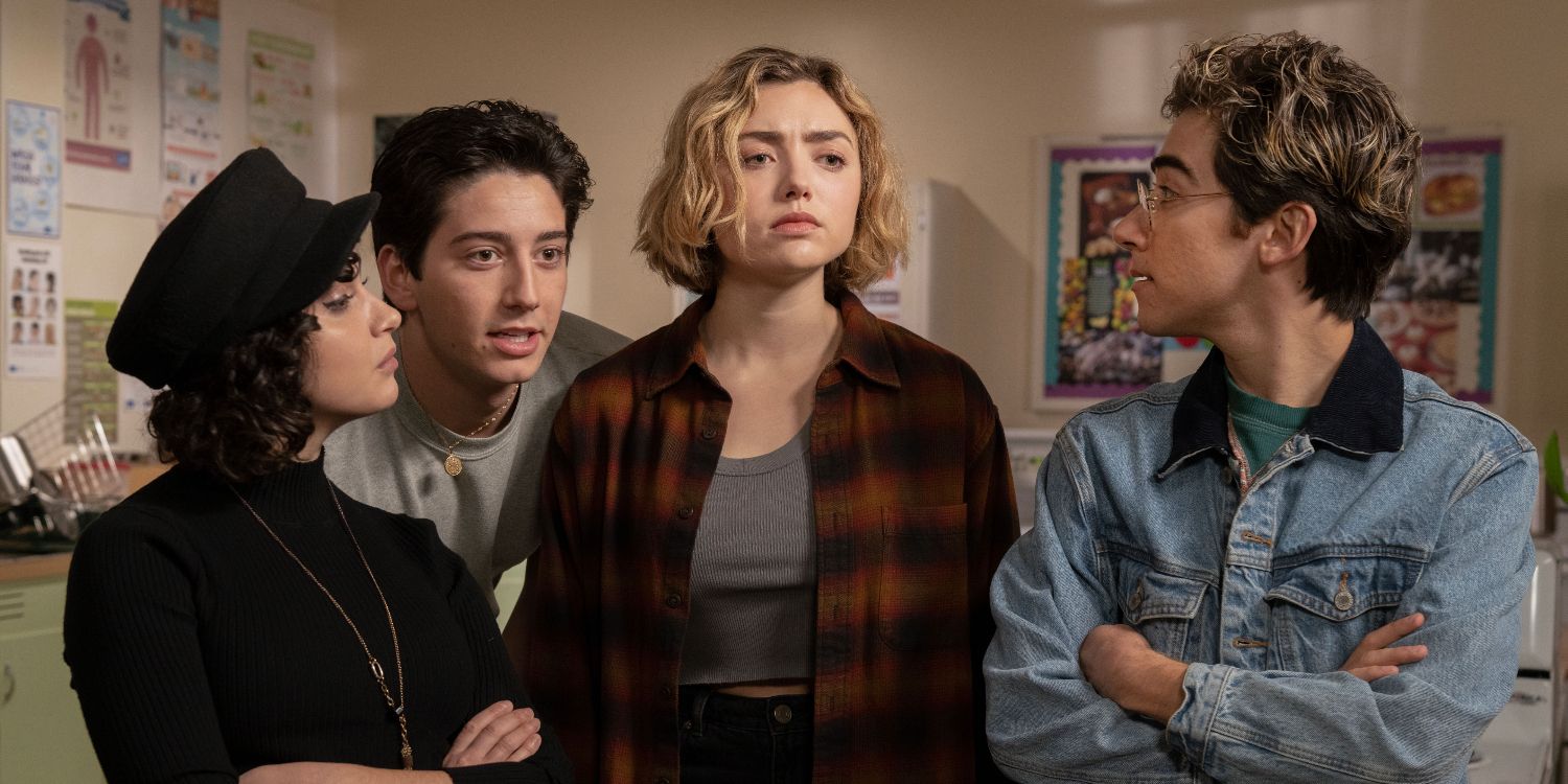 An image of Maddie (Peyton List) standing with her friends (including Milo Manheim) in School Spirits