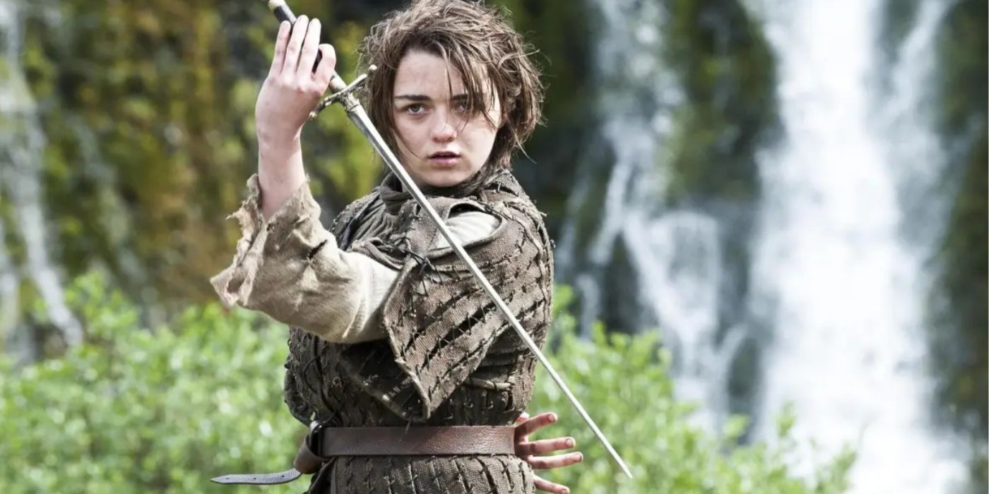 Arya Stark With Her Sword Practicing In A Field 