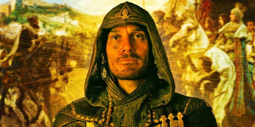 Michael Fassbender in a robe with a mural behind him in Assassins Creed