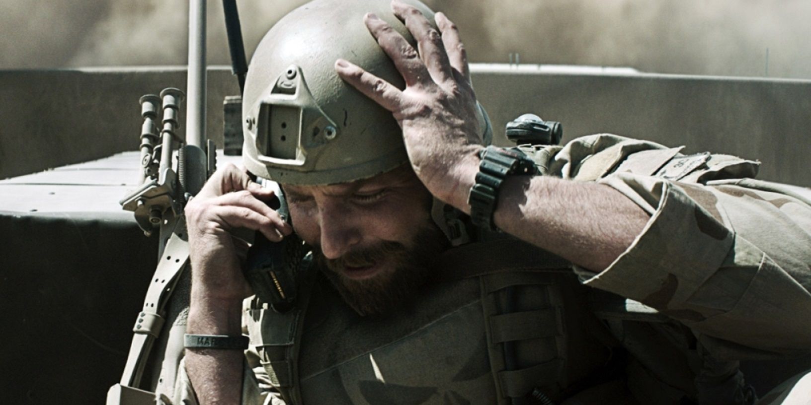 Bradley Cooper using a satellite phone in American Sniper