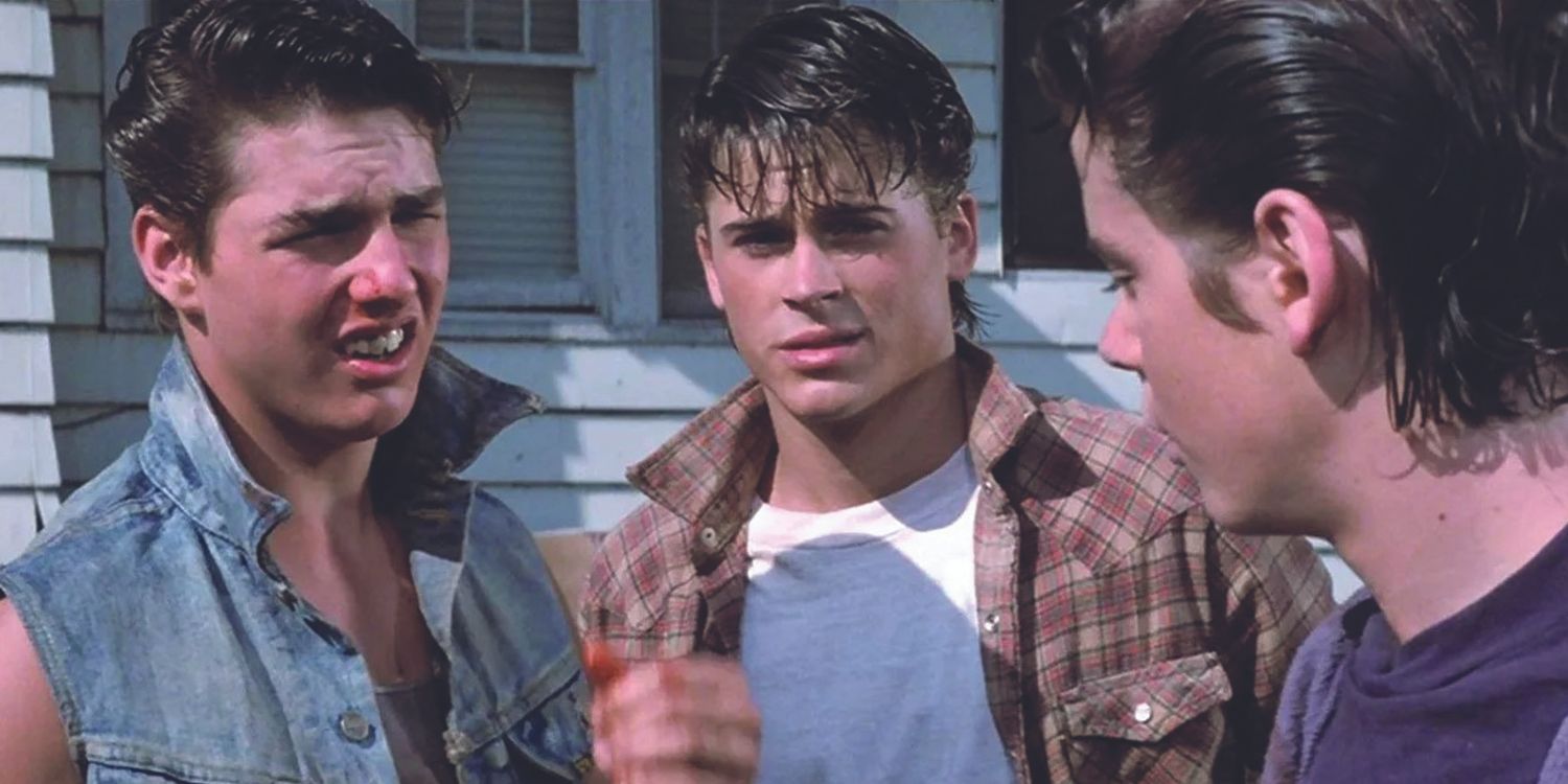 C Thomas Howell as Ponyboy, Tom Cruise as Randy, and Rob Lowe as Sodapop in The Outsiders