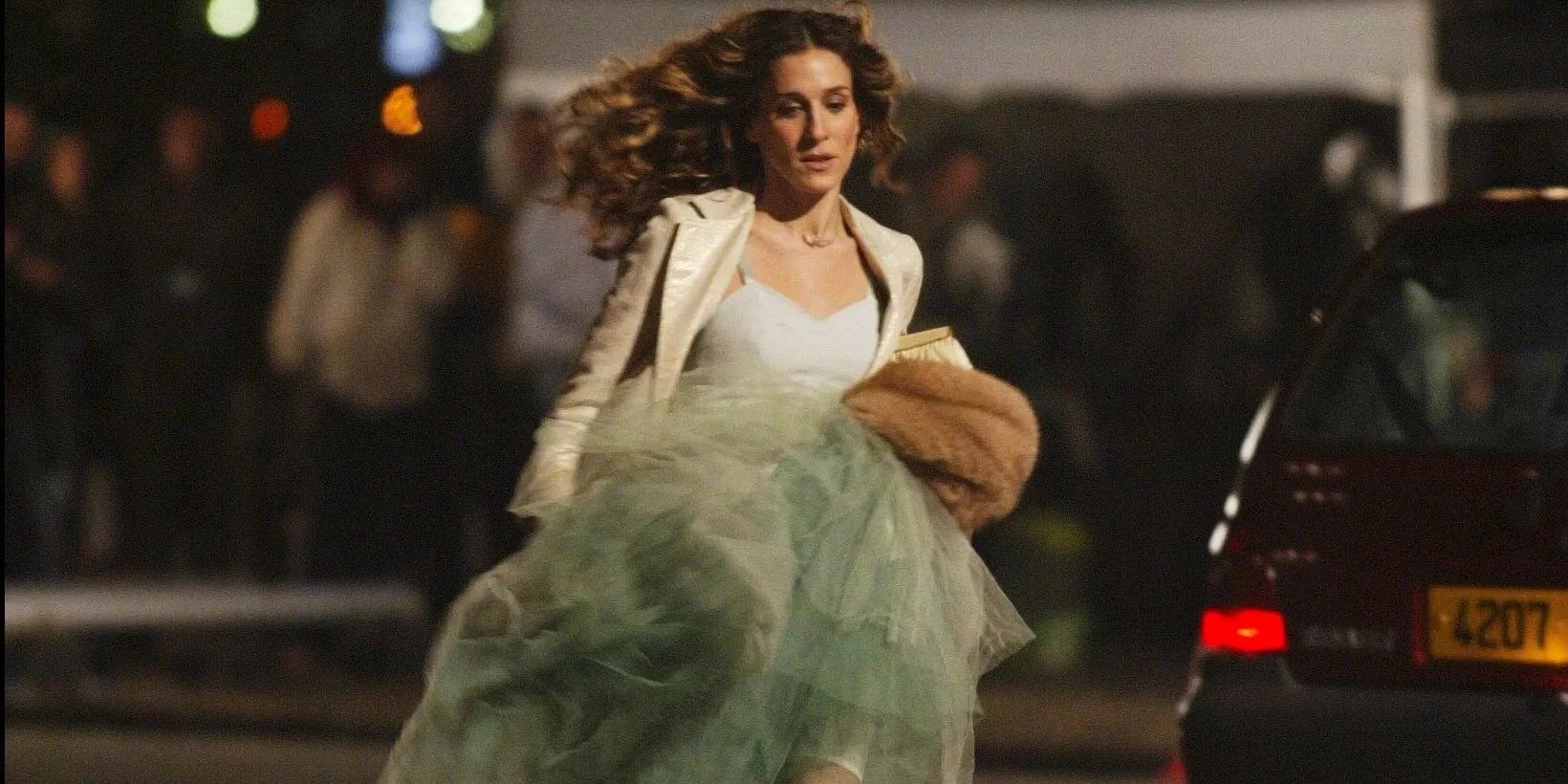 Carrie runs across the street in Sex and the City