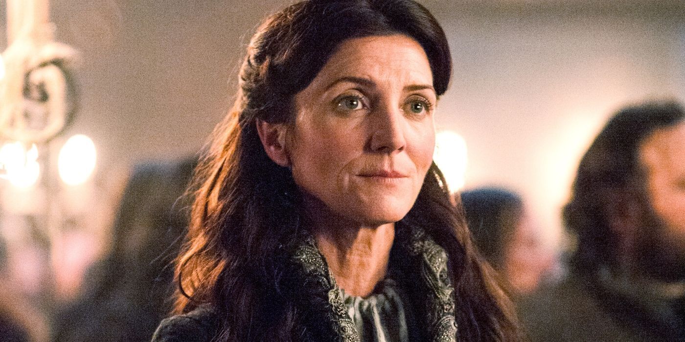 Michelle Fairley as Catelyn Stark looking worried in Game of Thrones